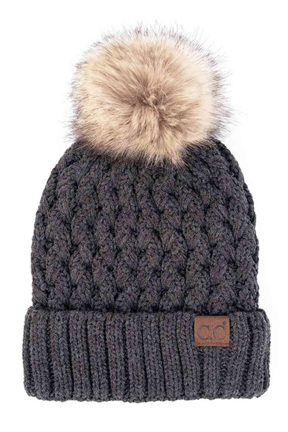 Charocal Elevate your winter wardrobe with the C.C Lattice Crossover Stitch Beanie, featuring an intricate lattice pattern and cozy pom detail. Crafted from 100% soft acrylic, this beanie delivers warmth and comfort without the weight. The crossover stitch design adds visual interest while the relaxed fit suits most face shapes. Perfect for layering over your favorite winter looks, this versatile beanie transitions effortlessly from casual outings to outdoor adventures. One size fits most for easy, everyday