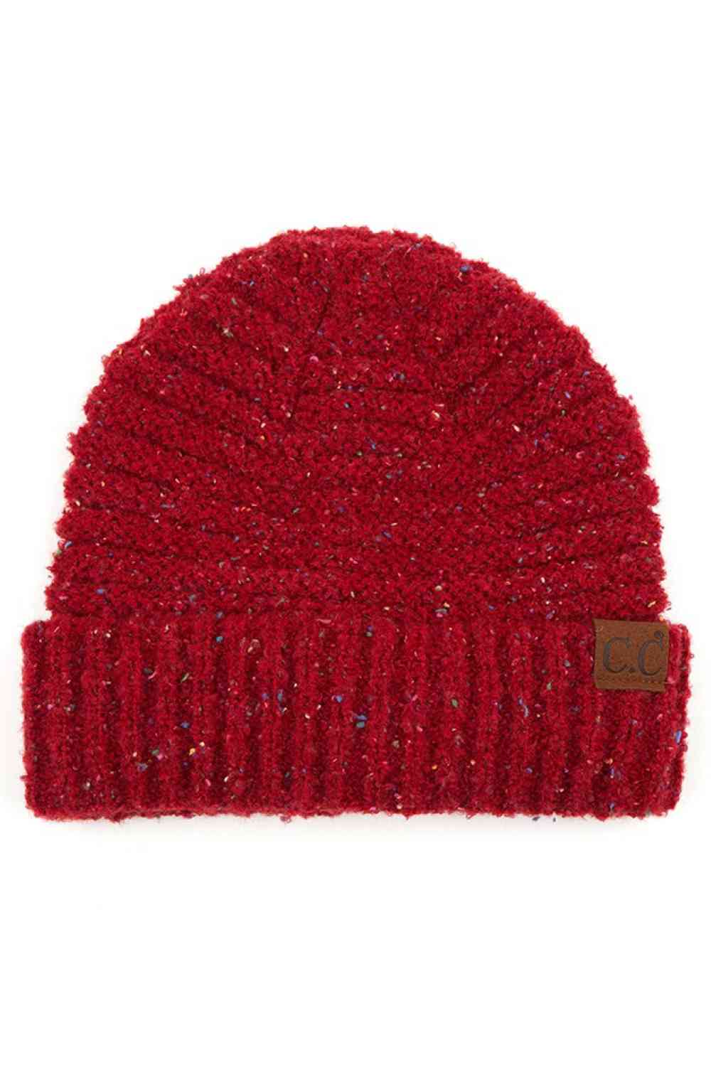 Chili Pepper Elevate your winter wardrobe with this C.C Confetti Boucle Yarn Beanie, crafted from a premium blend of 95% polyester and 5% cotton. The textured boucle yarn creates visual interest and dimension, making it the perfect accessory to complement any outfit.