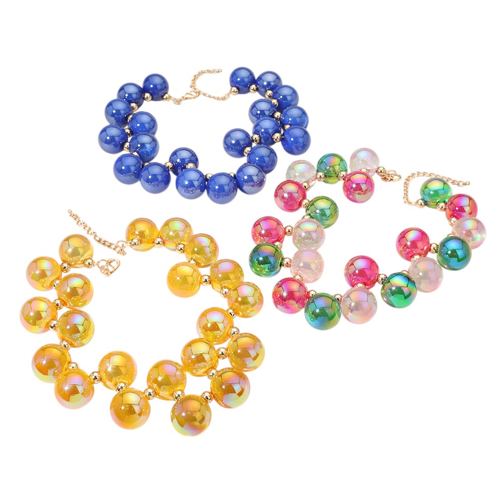 chunky iridescent ball beaded necklace elevates any outfit with its unique and eye-catching design. The perfectly placed beads create a glamorous and statement-making accessory. Crafted with quality materials, this necklace is a must-have for any fashion enthusiast. 