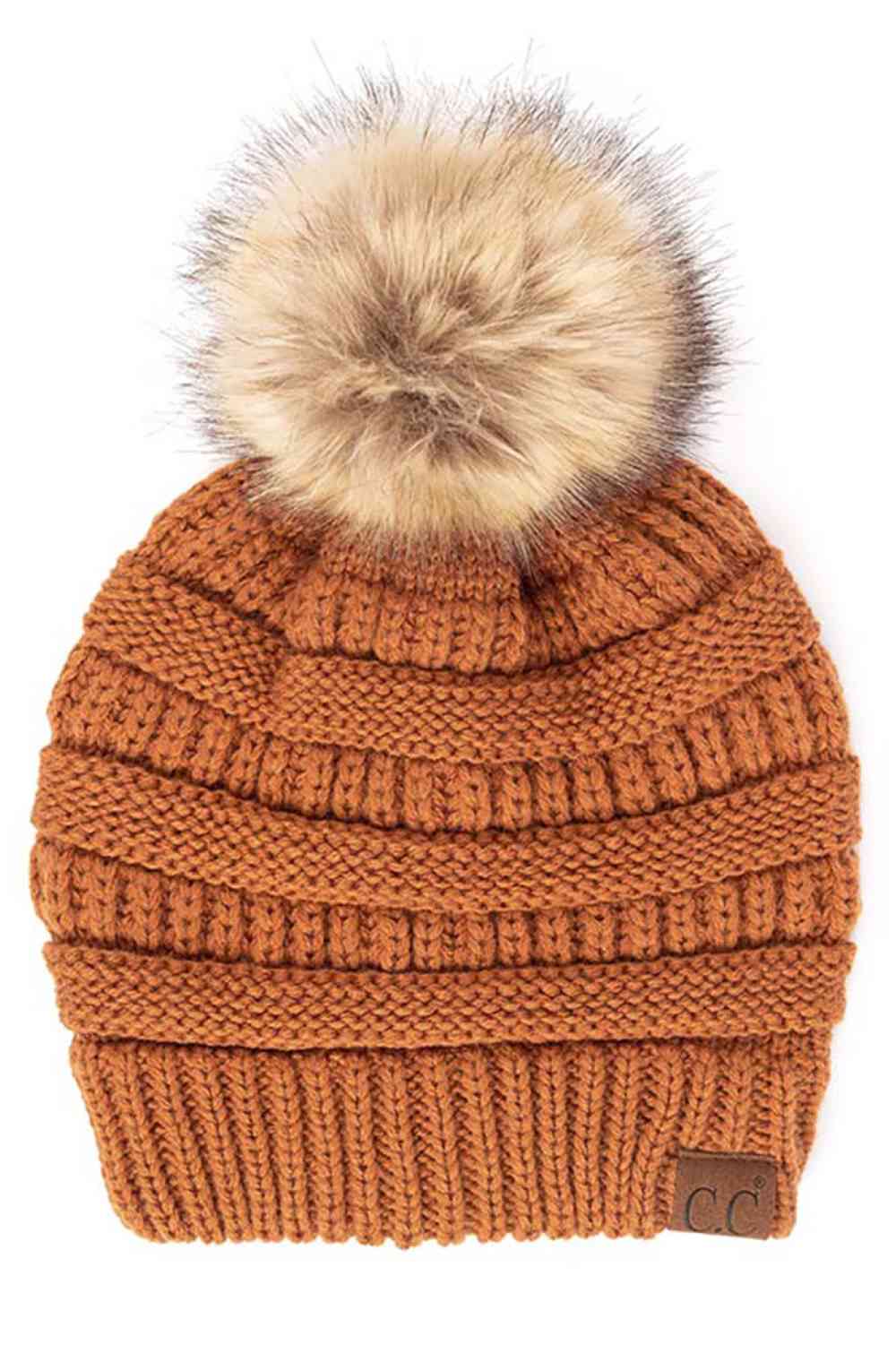 Clay Stay warm and cozy with this classic C.C Pom Pom Knit Beanie, crafted from 100% soft acrylic for all-day comfort. The ribbed knit design adds texture and durability, while the signature pom pom on top brings a playful touch to any winter outfit. One size fits most, making it the perfect accessory for everyone. Ideal for cold weather adventures or casual everyday wear.