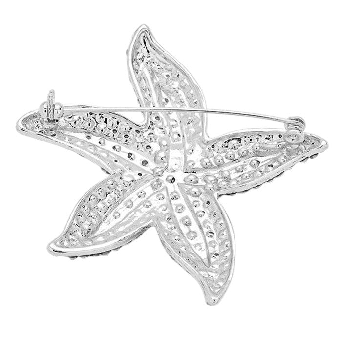 Clear Crystal Rhinestone Starfish Pin Brooch features sparkling crystals, adding a touch of elegance and charm to any outfit. The unique starfish design is perfect for beachgoers and ocean lovers. Made with high-quality materials for long-lasting wearability.