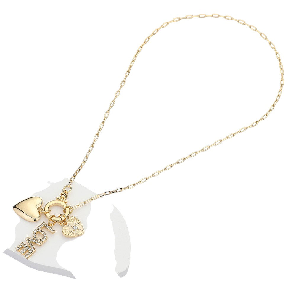 Clear Gold Stone Paved LOVE Message Metal Heart Charms Pendant Paperclip Chain Necklace is the perfect addition to any jewelry collection. With delicate stone paving and a unique paperclip chain design, it exudes elegance and sophistication. Show your love and elevate any outfit with this stunning necklace.