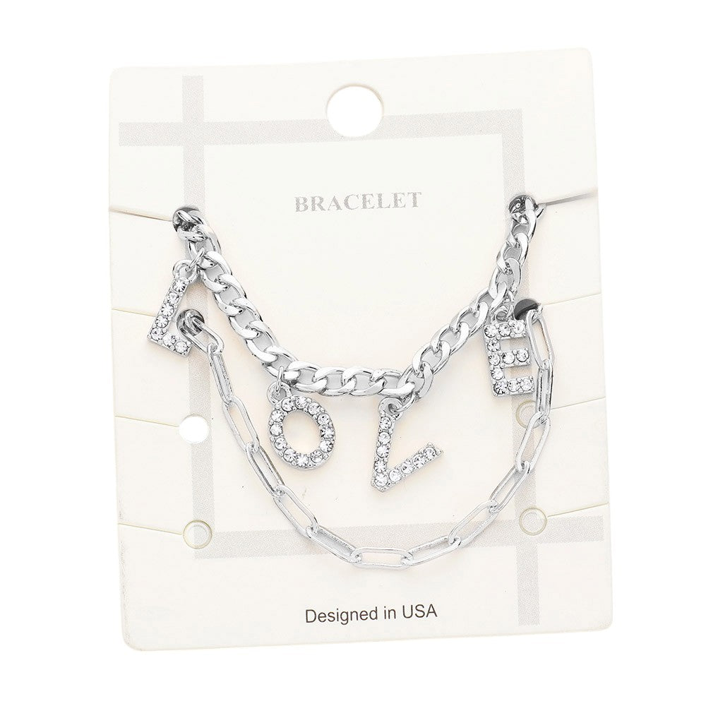 Clear Rhodium 2PCS LOVE Rhinestone Embellished Metal Chain Bracelets add a touch of elegance to any outfit. The rhinestone embellishments add sparkle and shine, while the metal chain offers durability. Perfect for day or evening wear, these bracelets are a must-have accessory for any fashion-forward individual.