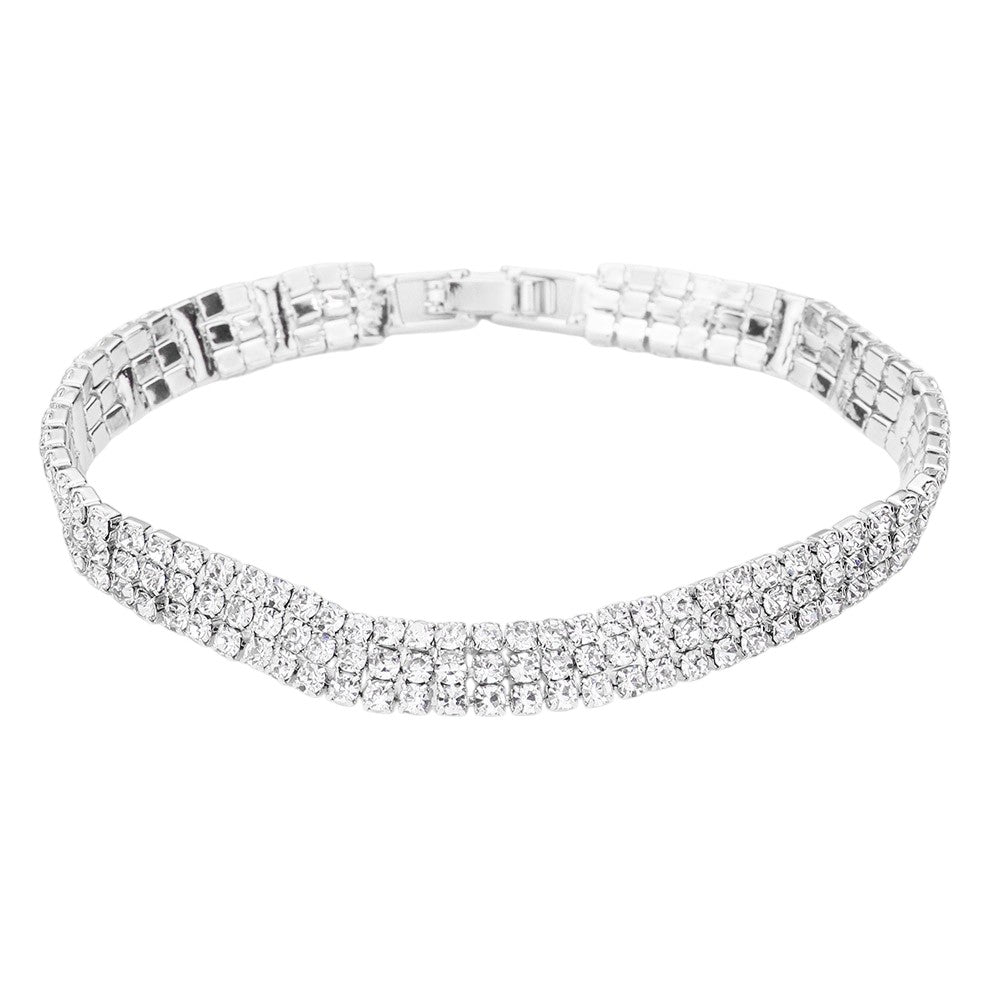 Clear Silver 3Rows Rhinestone Evening Bracelet adds the perfect touch of sparkle to any formal occasion. With its intricate design and high-quality rhinestones, it exudes luxury and sophistication. Expertly crafted for a comfortable fit, this bracelet is the perfect accessory to elevate your evening ensemble.