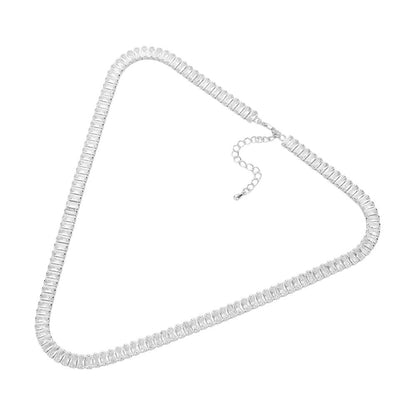 Clear Silver  Stainless Steel Emerald Cut CZ Stone Tennis Chain Necklace exudes elegance and sophistication. Made with durable stainless steel and featuring sparkling emerald cut CZ stones, it's the perfect accessory to elevate any outfit. With its classic tennis chain design and stunning stones, this necklace is a must-have for any jewelry collection.