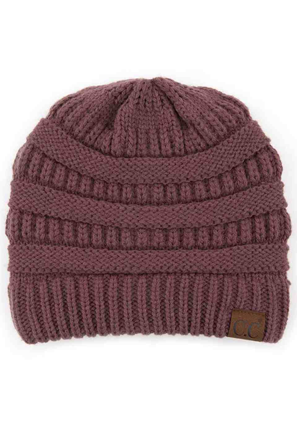 CocoBerry C.C Ribbed Knit Solid Color Beanie offers a timeless design with durable ribbed knitting, ensuring a snug and comfortable fit. Crafted for warmth and versatility, this beanie is perfect for everyday wear, providing reliable protection against cold weather while maintaining a sleek, minimalist style that complements any outfit. Its solid color adds understated appeal, making it an essential accessory for both casual and outdoor use. 