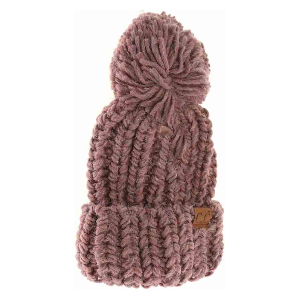 CocoBerry Chunky Knit Yarn Pom C.C Beanie offers expert craftsmanship combining warmth and style in one accessory. Its dense yarn knit provides superior insulation, making it ideal for cold climates. The textured knit pattern ensures durability, while the classic pom pom adds a refined, casual appeal. Designed for a comfortable fit, this beanie maintains warmth without sacrificing breathability, making it a must-have for both outdoor enthusiasts and everyday wear.