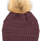 Cocoberry Stay warm and cozy with this classic C.C Pom Pom Knit Beanie, crafted from 100% soft acrylic for all-day comfort. The ribbed knit design adds texture and durability, while the signature pom pom on top brings a playful touch to any winter outfit. One size fits most, making it the perfect accessory for everyone. Ideal for cold weather adventures or casual everyday wear.
