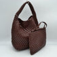 Coffee This stylish everyday hobo bag features an all-over classic basket weave design and a slouchy silhouette. It is crafted with a seamless, integrated wide top handle that transitions directly into the main storage compartment for comfortable hand or shoulder carrying.