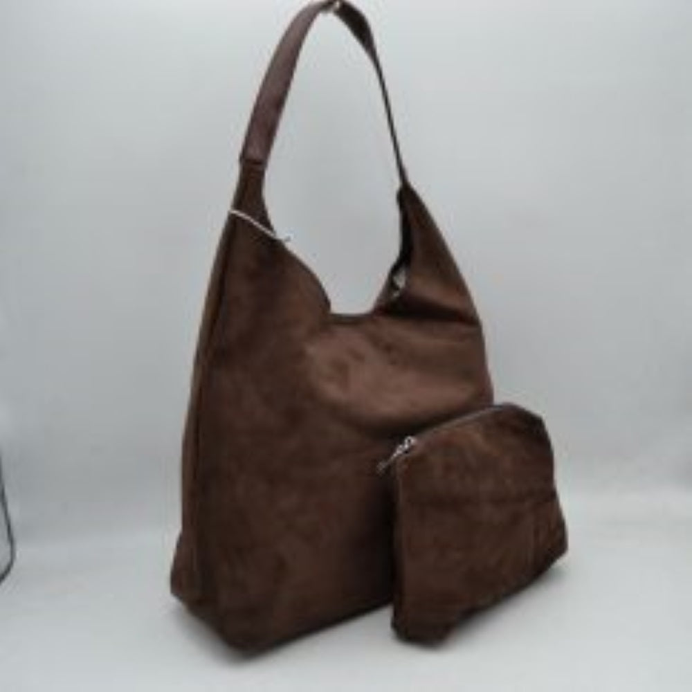 Coffee This slouchy hobo bag features a clean, soft-textured exterior and a relaxed silhouette that makes it an excellent choice for everyday use. Designed with a wide, flat shoulder strap for comfortable carrying, the bag offers a spacious main compartment to easily organize and store larger essentials. Accompanied by a separate, matching inner pouch featuring a secure metallic zipper closure, this versatile set ensures smaller items stay safely tucked away.