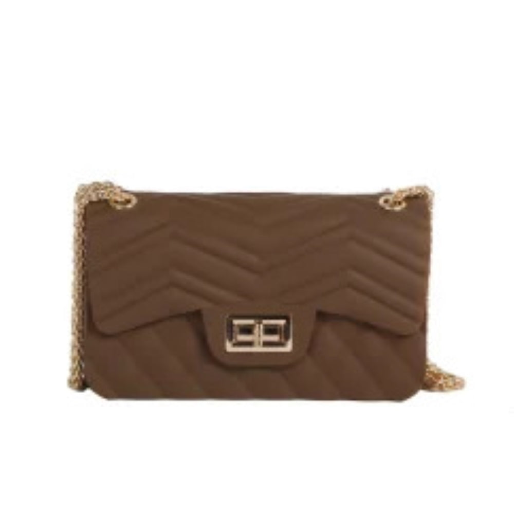 Coffee This stylish shoulder bag features a classic chevron quilted pattern across the front flap, offering an elegant aesthetic for evening or daily wear. Designed with a structured rectangular silhouette, it is secured with a polished gold-tone rectangular turn-lock closure on the front. A woven metallic gold-tone chain strap provides comfortable, hands-free carrying over the shoulder or across the body.