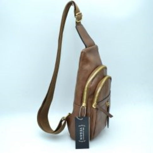 Coffee This functional sling bag features a textured, subtly grained exterior with an asymmetric silhouette ideal for active everyday use. It provides multiple organized storage compartments, including a spacious curved main section, an intermediate arched front pocket with a decorative perforated design, and a lower pouch featuring a vertical zipper closure and an elongated pull tab. The design is completed by a single wide