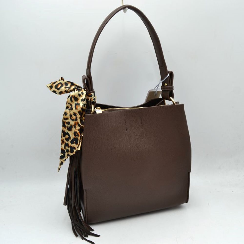Coffee This structured shoulder bag features a clean, classic silhouette with a finely textured dark brown exterior, making it a stylish choice for everyday versatility. The design is detailed with an integrated top shoulder strap secured by polished gold-tone side rings. It stands out with a decorative, silky leopard-print scarf tied around one of the strap loops, complemented by a cascading long fringe tassel on the side for added movement and texture.