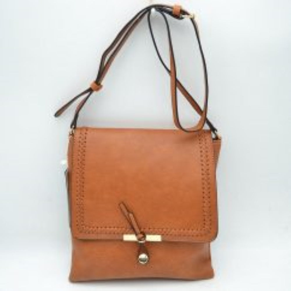 Cognac Infuse your daily style with a touch of bohemian elegance with this classic flap crossbody bag. Boasting a softly structured, vertical square silhouette, this handbag stands out with intricate braided stitched detailing that frames the edges of the main top flap. A unique, polished metallic bar and dangling pull-tab closure anchor the front, offering a secure seal and a contemporary focal point.