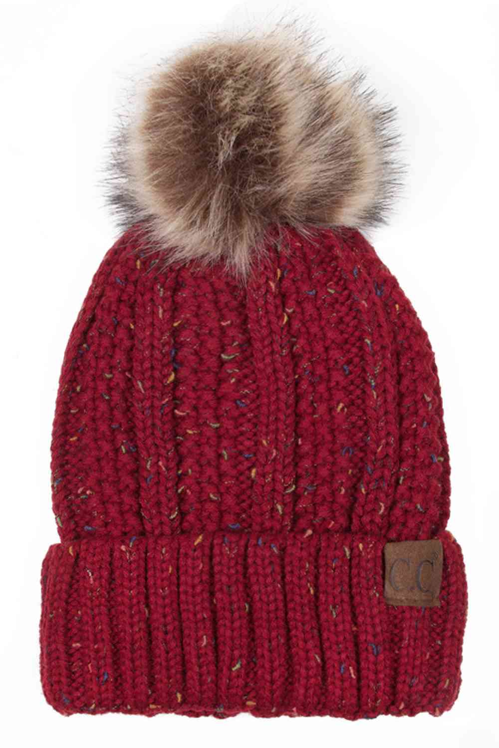 Burgundy The C.C Fuzzy Fleece Lining Knit Beanie with Pom combines a soft knit exterior with a cozy fleece lining for extra warmth and comfort on chilly days. Finished with a fluffy pom-pom on top, it adds a cute and stylish touch to your winter wardrobe.