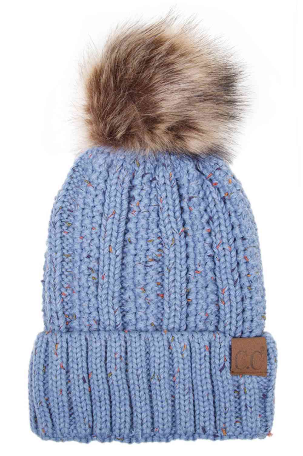 Denim The C.C Fuzzy Fleece Lining Knit Beanie with Pom combines a soft knit exterior with a cozy fleece lining for extra warmth and comfort on chilly days. Finished with a fluffy pom-pom on top, it adds a cute and stylish touch to your winter wardrobe.