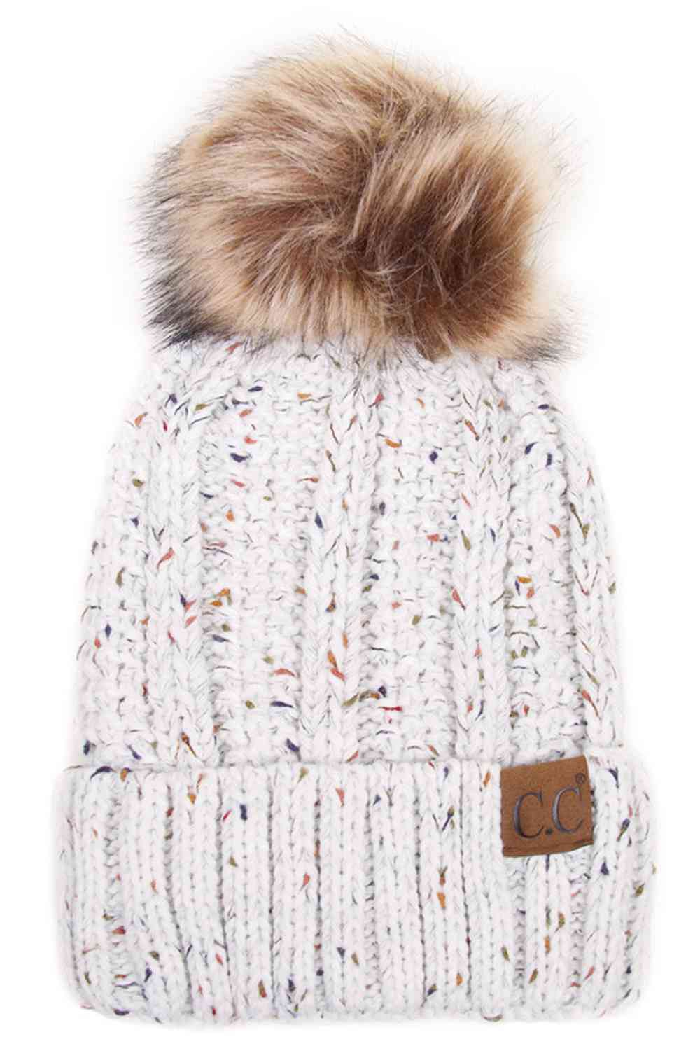 Ivory The C.C Fuzzy Fleece Lining Knit Beanie with Pom combines a soft knit exterior with a cozy fleece lining for extra warmth and comfort on chilly days. Finished with a fluffy pom-pom on top, it adds a cute and stylish touch to your winter wardrobe.