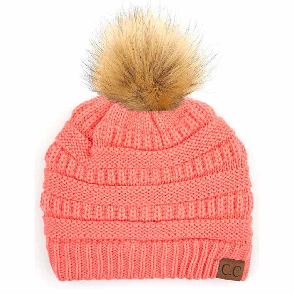 Coral Stay warm and cozy with this classic C.C Pom Pom Knit Beanie, crafted from 100% soft acrylic for all-day comfort. The ribbed knit design adds texture and durability, while the signature pom pom on top brings a playful touch to any winter outfit. One size fits most, making it the perfect accessory for everyone. Ideal for cold weather adventures or casual everyday wear.