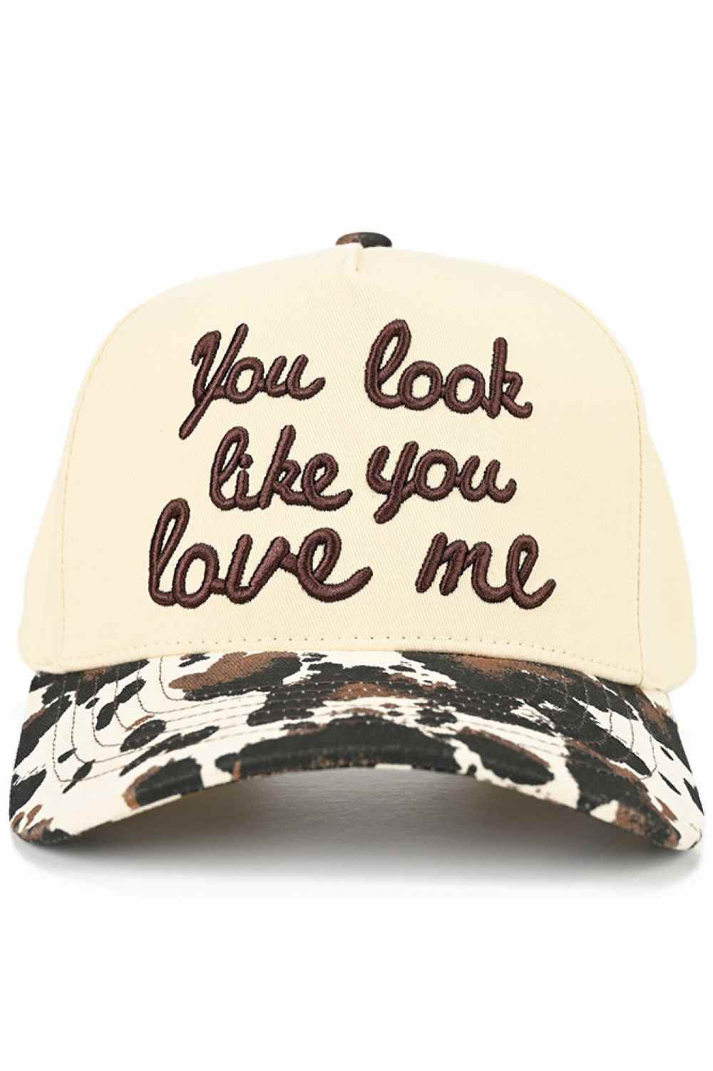 Cow Playful and bold, the C.C YOU LOOK LIKE YOU LOVE ME Trucker Hat adds instant personality to any casual outfit with its eye-catching slogan. Designed with a classic snap-back closure and breathable mesh back, it offers a comfortable, adjustable fit perfect for everyday wear.
