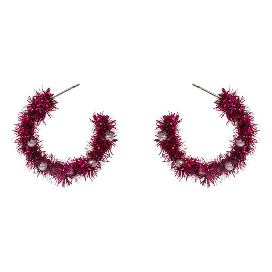 Celebrate the season with these festive tinsel hoop earrings, decorated with miniature ornament accents for a cheerful holiday touch. Lightweight and eye-catching, they’re perfect for adding playful flair to party outfits, winter gatherings, or seasonal celebrations.