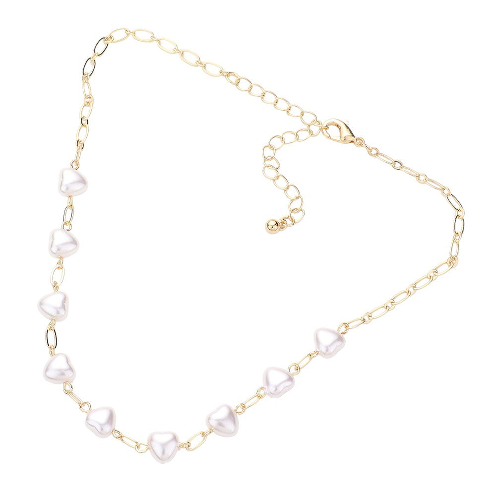 Cream Heart Pearl Link Choker Necklace, is crafted with the utmost attention to detail and quality. It features a unique link design and a stunning heart-shaped pearl, perfect for special occasions or gifting. Its classic design makes it a timeless addition to any collection.