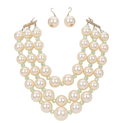Cream Triple Layered Chunky Pearl Necklace is a gorgeous addition to any outfit. Made with high-quality pearls in a unique triple layer design, this necklace adds a touch of elegance and sophistication to your look. Its chunky style makes a statement while still remaining versatile for any occasion. Upgrade your jewelry collection with this must-have piece. 