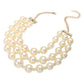 Triple Layered Chunky Pearl Necklace is a gorgeous addition to any outfit. Made with high-quality pearls in a unique triple layer design, this necklace adds a touch of elegance and sophistication to your look. Its chunky style makes a statement while still remaining versatile for any occasion. Upgrade your jewelry collection with this must-have piece. 