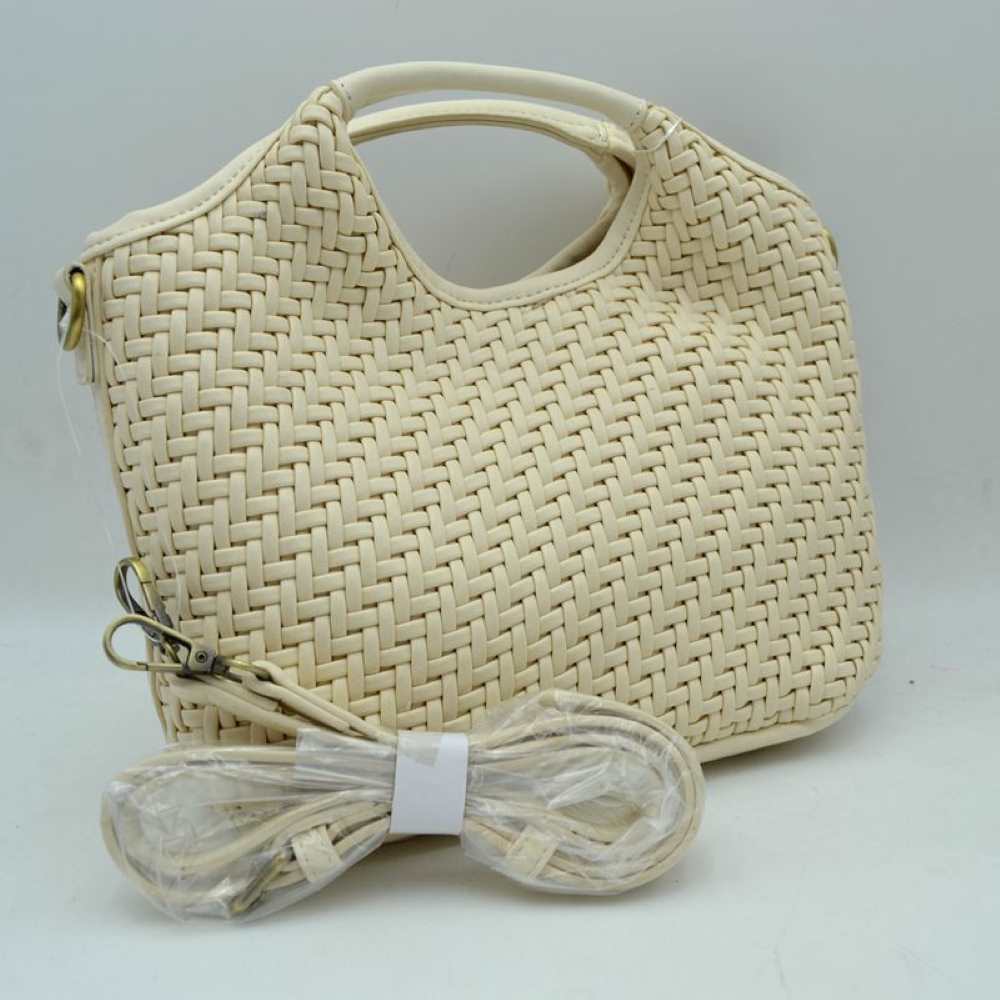Cream Step up your style game with this stunning woven satchel. Combining structural luxury with a rich, tactile finish, this handbag showcases an intricate basket-weave design that mimics classic Italian artisan craftsmanship. Perfect for making a statement at work, evening dinners, or casual weekend outings, its unique silhouette serves as the ultimate transitional accessory.