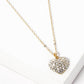 Crystal Pave Heart Pendant Necklace is crafted to bring a touch of sophistication to any outfit. Its sparkling pave crystals are timeless and elegant, while the heart-shaped pendant symbolizes love and affection. Made from high-quality materials, this necklace is designed to make a statement and elevate your style effortlessly. 