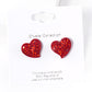 Crystal Rhinestone Paved Heart Stud Earrings bring a touch of elegance to any outfit. The sparkling rhinestones are intricately arranged in a heart-shaped design, adding a romantic and sophisticated charm to your look. Perfect for any occasion, these earrings are a must-have addition to any jewelry collection. 