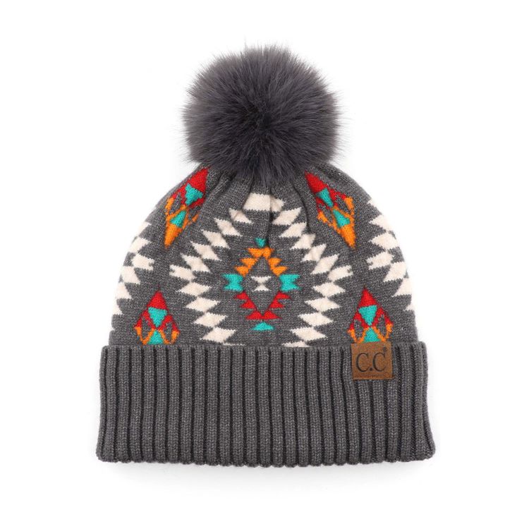 Dark Gray C.C Soft Aztec Pattern Beanie with Faux Fur Pom,&nbsp;is beautifully knitted with a variety of colors and design that brings a unique look. Coordinate these aztec pattern beannie with any outfit to match the best with absolute warmth and coziness in style. This is an ideal winter head cover that comes in one size winter cap with a faux fur pom that fits most head sizes. Perfect winter gift accessory for your friends, family, and the persons you love.