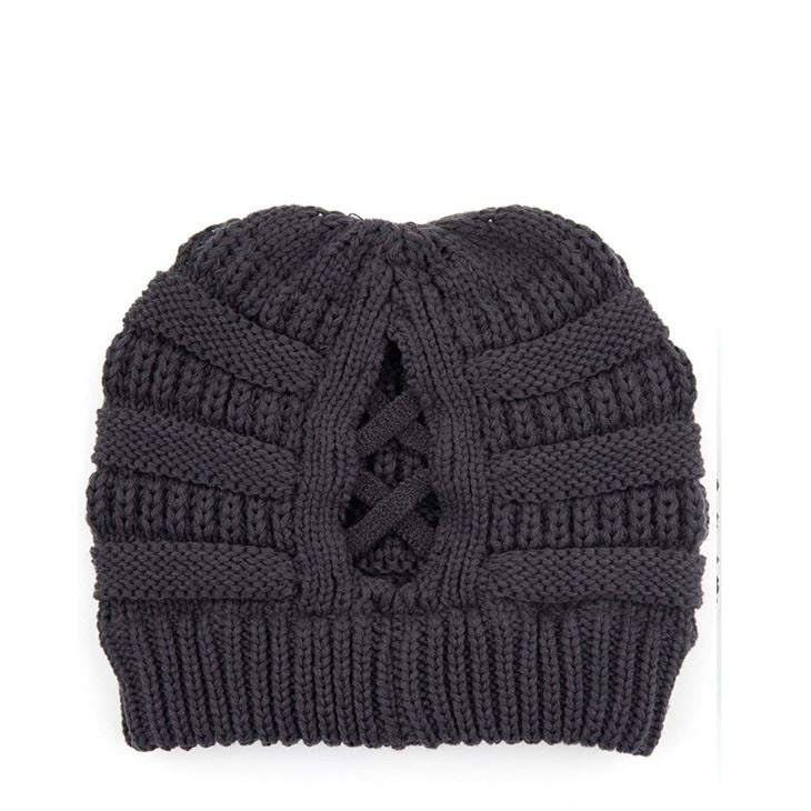 Dark Melange Grey Criss-Cross Knit C.C Beanie blends stylish design with practical warmth. Crafted with a unique criss-cross knit pattern, it provides enhanced insulation and a comfortable fit. Ideal for cold weather, this beanie offers both functionality and a sophisticated look for everyday wear. Durable and easy to care for, it’s an excellent accessory for layering during chilly seasons.