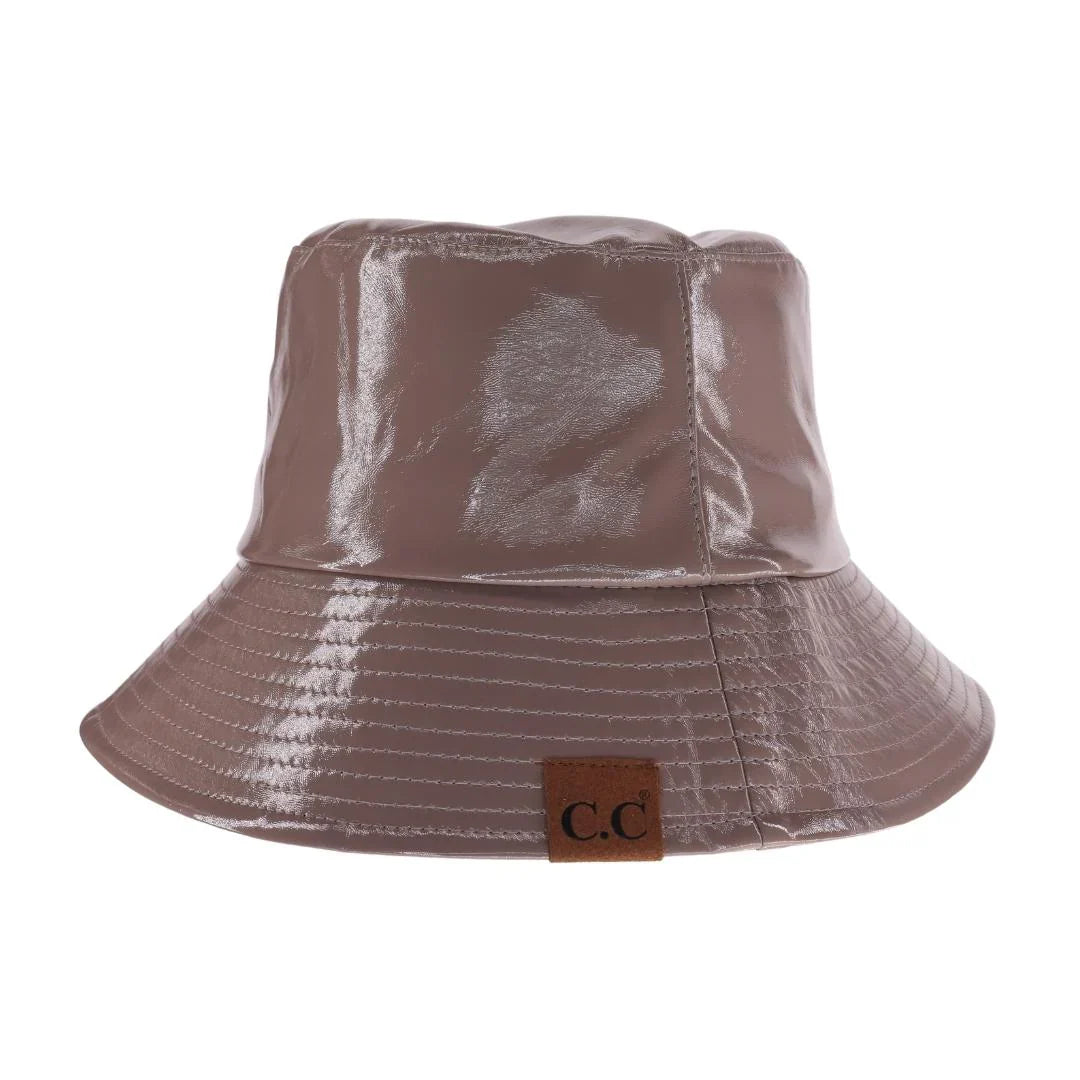 Dark-Taupe C.C Vegan Leather Bucket Hat offers a stylish and cruelty-free option for sun protection. Made from premium vegan leather, this hat provides both fashion and functionality. Keep your head cool and protected while making an ethical choice.