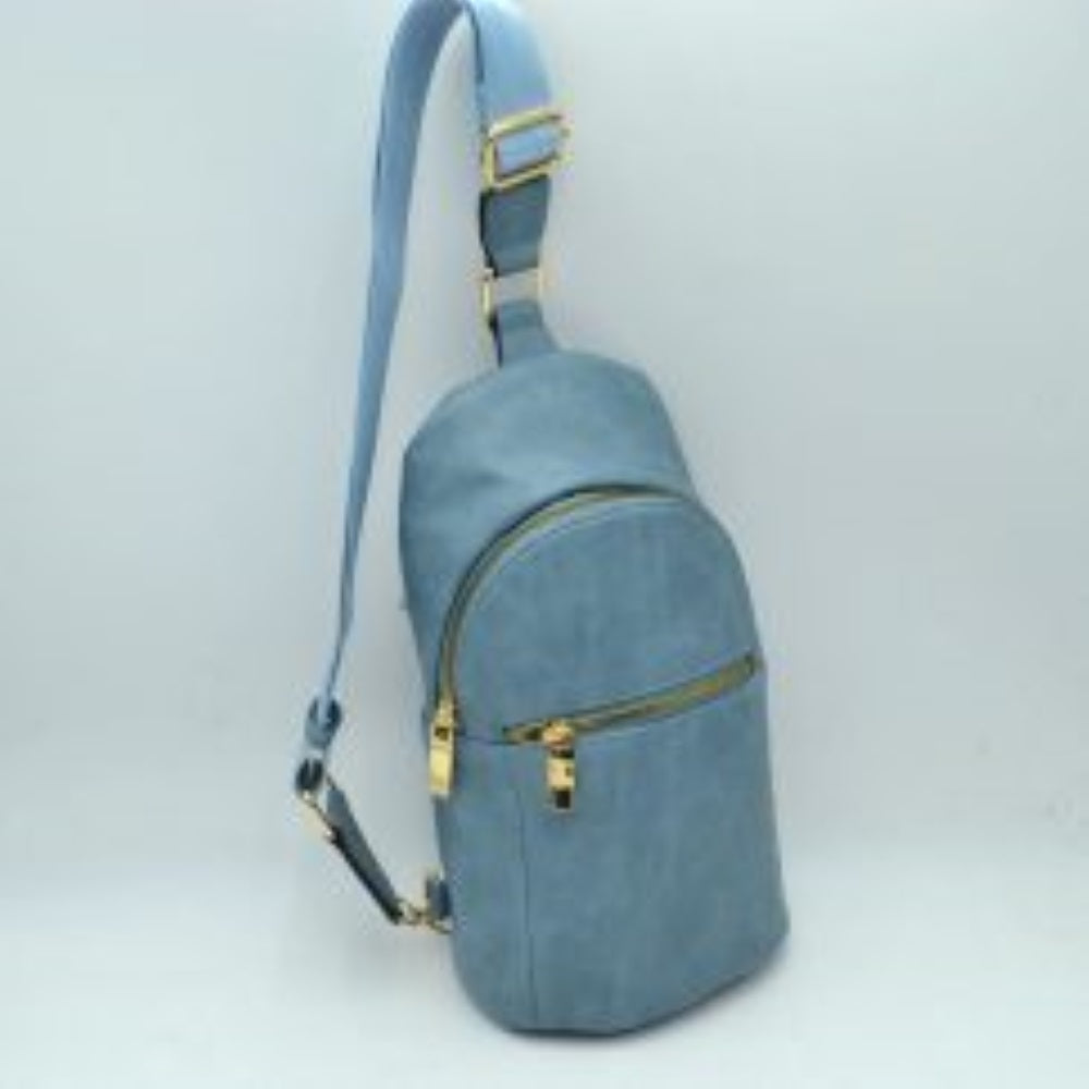 Dark-blue This practical sling bag features a textured, grained finish exterior engineered for active everyday use. It provides multiple tiered storage compartments, including a curved main zippered section and a smaller, secondary horizontal zippered front pocket to keep essentials organized. The bag is designed with a single wide shoulder strap style that connects through a square metallic loop and includes an integrated adjustment buckle to alter the carrying length easily.
