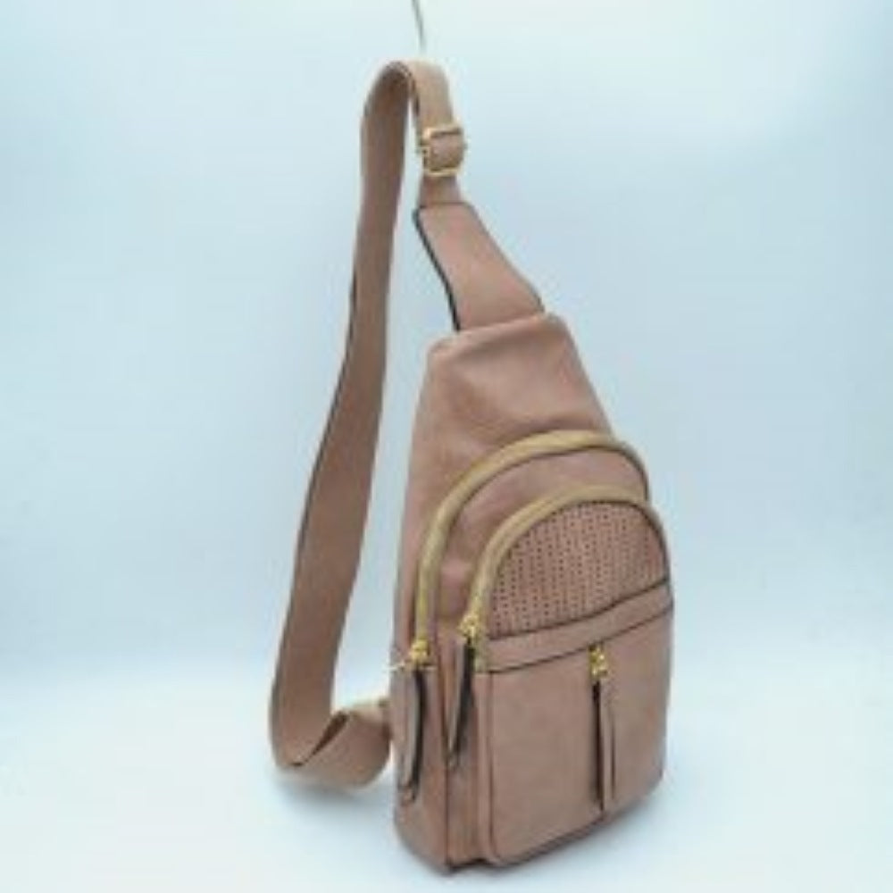 Dark-blush This functional sling bag features a textured, subtly grained exterior with an asymmetric silhouette ideal for active everyday use. It provides multiple organized storage compartments, including a spacious curved main section, an intermediate arched front pocket with a decorative perforated design, and a lower pouch featuring a vertical zipper closure and an elongated pull tab. The design is completed by a single wide