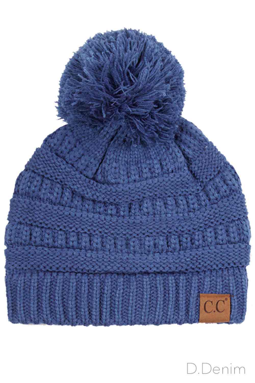 Dark Denim Crafted from premium soft acrylic, this C.C knitted beanie delivers warmth and comfort through its quality construction. The classic design features a charming knit pom-pom that adds visual appeal while the one-size-fits-most fit ensures accessibility for most wearers. Ideal for cold weather layering, this versatile beanie transitions seamlessly from casual outings to outdoor activities, making it a practical addition to any seasonal wardrobe.