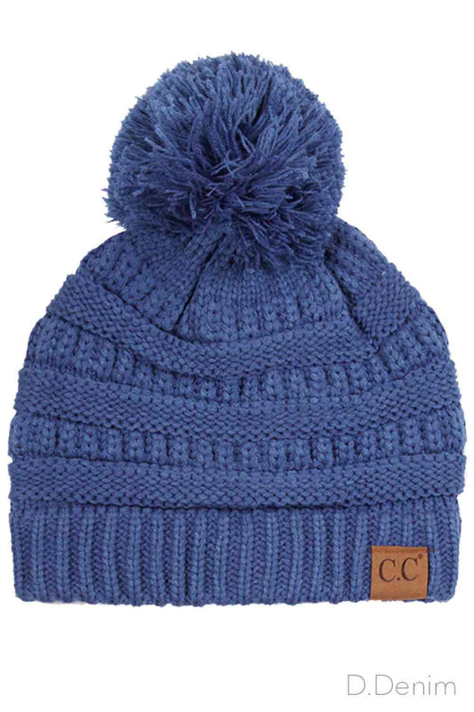 Dark Denim Crafted from premium soft acrylic, this C.C knitted beanie delivers warmth and comfort through its quality construction. The classic design features a charming knit pom-pom that adds visual appeal while the one-size-fits-most fit ensures accessibility for most wearers. Ideal for cold weather layering, this versatile beanie transitions seamlessly from casual outings to outdoor activities, making it a practical addition to any seasonal wardrobe.