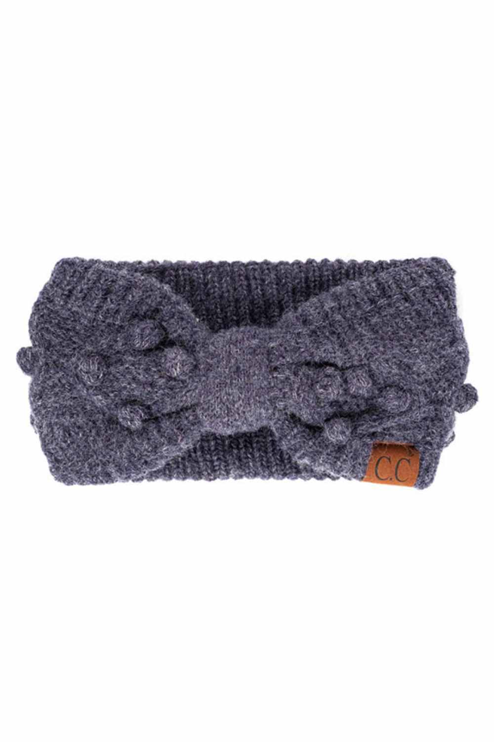 Dark Denim Cozy up with the C.C Bobble Headwrap, the perfect accessory for chilly days and casual style. Crafted from 100% acrylic, this soft and stretchy headwrap features handmade bobbles that add playful texture and charm. One size fits most, making it an easy grab-and-go essential. Whether you're running errands or bundling up outdoors, this versatile wrap keeps you warm while adding a touch of personality to any outfit. Made in China with quality craftsmanship you can trust.