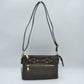 Dark-Gray This functional crossbody bag is designed for organized everyday use, featuring a textured exterior equipped with multiple secure storage compartments. The front panel includes a convenient horizontal zippered pocket accented with an oversized metallic zipper pull, situated beneath a decorative horizontal band detailed with metallic studs and loops.