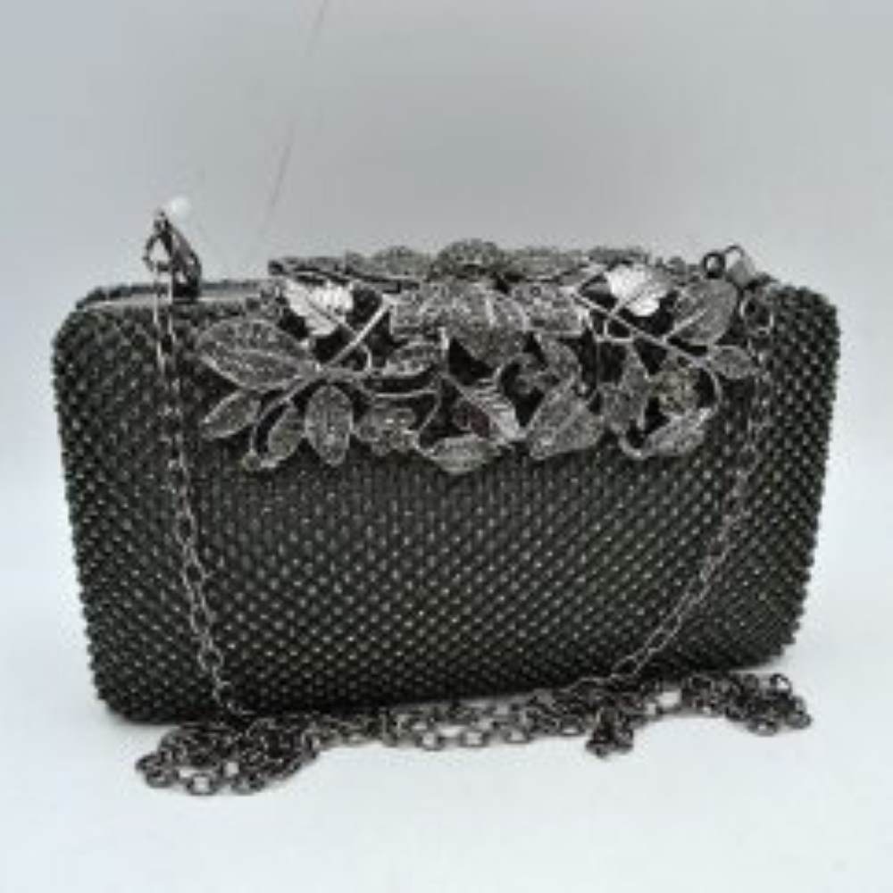 Dark-gray Designed with a rigid rectangular silhouette, this sophisticated box clutch features a meticulously textured exterior composed of small, shimmering circular studs arranged in a uniform pattern. A detailed overlay consisting of metallic leaves and floral accents spans across the top closure, creating an elegant focal point while securing the main storage compartment. A matching link chain strap attaches seamlessly to the top edges