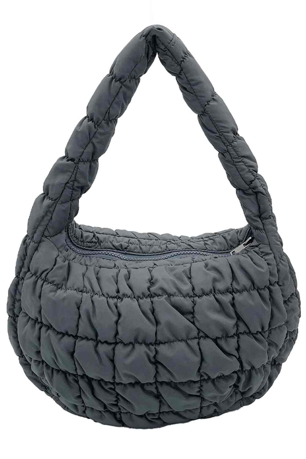 Dark Gray Compact quilted bag crafted from durable 100% polyester with a timeless solid design. Measuring 8.7" x 11.8" x 3.15", it's the perfect size for everyday essentials, travel accessories, or as a versatile organizer. The quilted texture adds visual interest and subtle structure. Ideal for on-the-go convenience with a sleek, minimalist aesthetic that pairs effortlessly with any outfit.