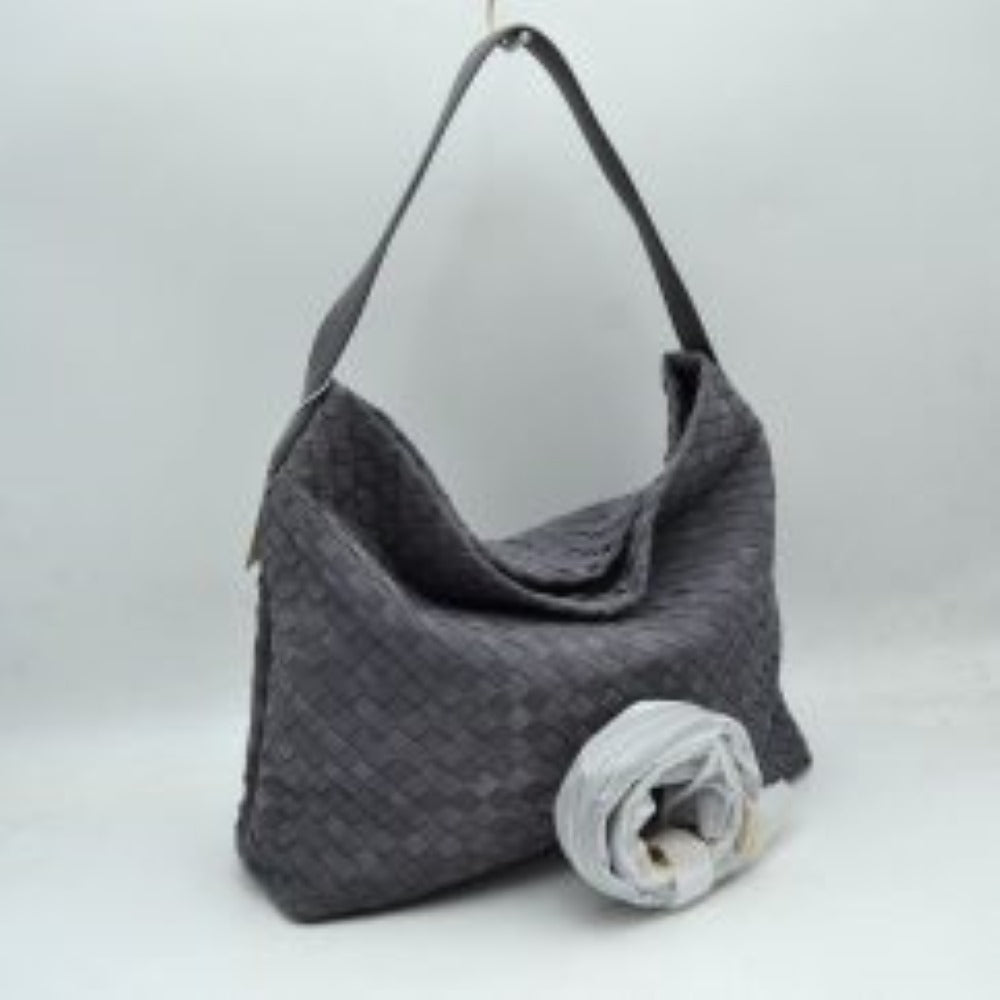 Dark-grey This slouchy hobo bag showcases a textured woven pattern across its exterior, offering a refined look that is perfect for everyday use. The spacious main compartment provides ample storage for daily essentials, featuring a relaxed silhouette with a flat top shoulder strap for comfortable carrying. A separate, detachable secondary strap with metallic clasps is included, allowing for versatile styling options to suit your needs.