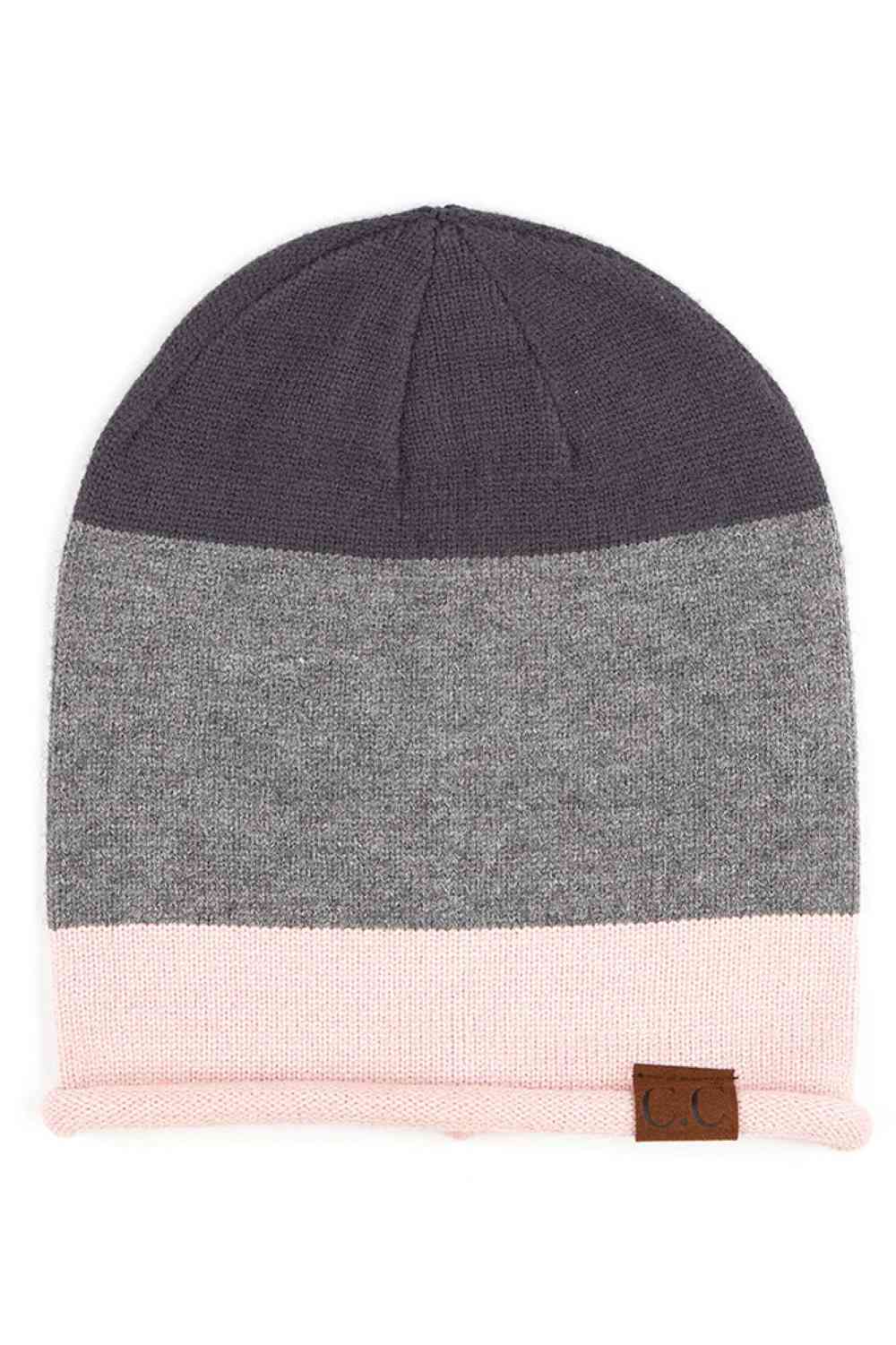 Dark Grey Elevate your winter wardrobe with the C.C Colorblock Rolled Cuff Slouchy Beanie, designed for comfort and contemporary style. This relaxed-fit beanie features a striking colorblock design with a rolled cuff that adds visual interest to any outfit. Perfect for chilly days when you want to stay cozy without compromising on style.