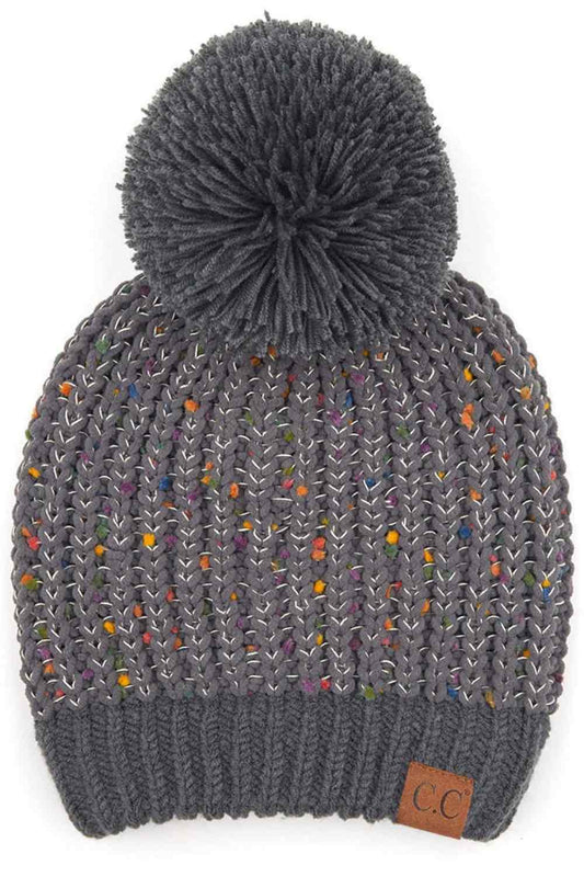 Dark Gray Elevate your winter wardrobe with this C.C Confetti Chenille Knit Pom Beanie, crafted from a premium blend of 50% acrylic, 43% polyester, and 7% nylon for durability and comfort. The soft chenille knit texture pairs beautifully with a cozy pom detail, making it perfect for both indoor and outdoor wear.