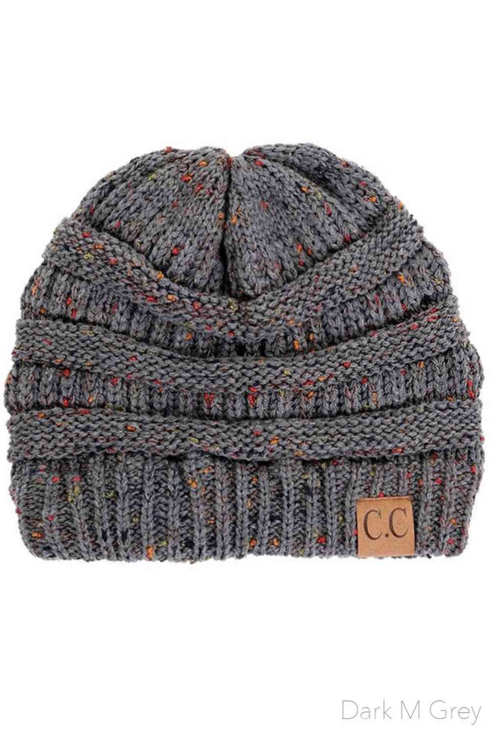 Dark Grey Stay warm with timeless style in this C.C Confetti Cable Knit Beanie. Crafted from 100% soft acrylic, the classic cable knit texture provides excellent insulation while maintaining breathability for all-day comfort. The playful confetti detailing adds visual interest to this versatile essential. Lightweight yet durable, this beanie transitions seamlessly from casual outings to outdoor adventures, making it a reliable choice for any season.