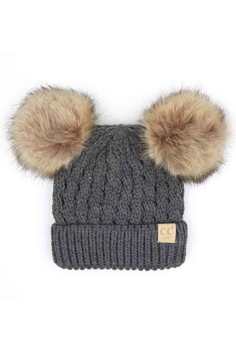 Dark Grey Keep your child warm and stylish with this C.C Kids Double Pom Pom Beanie. Featuring an all-over cable knit pattern and dual pom poms for extra charm, it's the perfect accessory for chilly days.