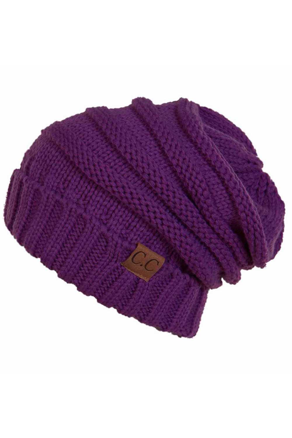 Dark Purple Wrap yourself in warmth with this C.C Slouchy Knitted Beanie, crafted from 100% soft acrylic for ultimate comfort. The oversized silhouette and plush pom pom detail create a relaxed, on-trend look perfect for chilly days. Available in nine versatile colors—Beige, Berry, Dark Denim, Heather Gray, Ivory, Pistachio, Rose, Steel Blue, and Violet Purple—this beanie pairs effortlessly with any winter wardrobe. The ribbed knit construction ensures durability and a flattering fit. Hand wash and lay flat