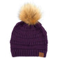 Dark Purple Stay warm and cozy with this classic C.C Pom Pom Knit Beanie, crafted from 100% soft acrylic for all-day comfort. The ribbed knit design adds texture and durability, while the signature pom pom on top brings a playful touch to any winter outfit. One size fits most, making it the perfect accessory for everyone. Ideal for cold weather adventures or casual everyday wear.