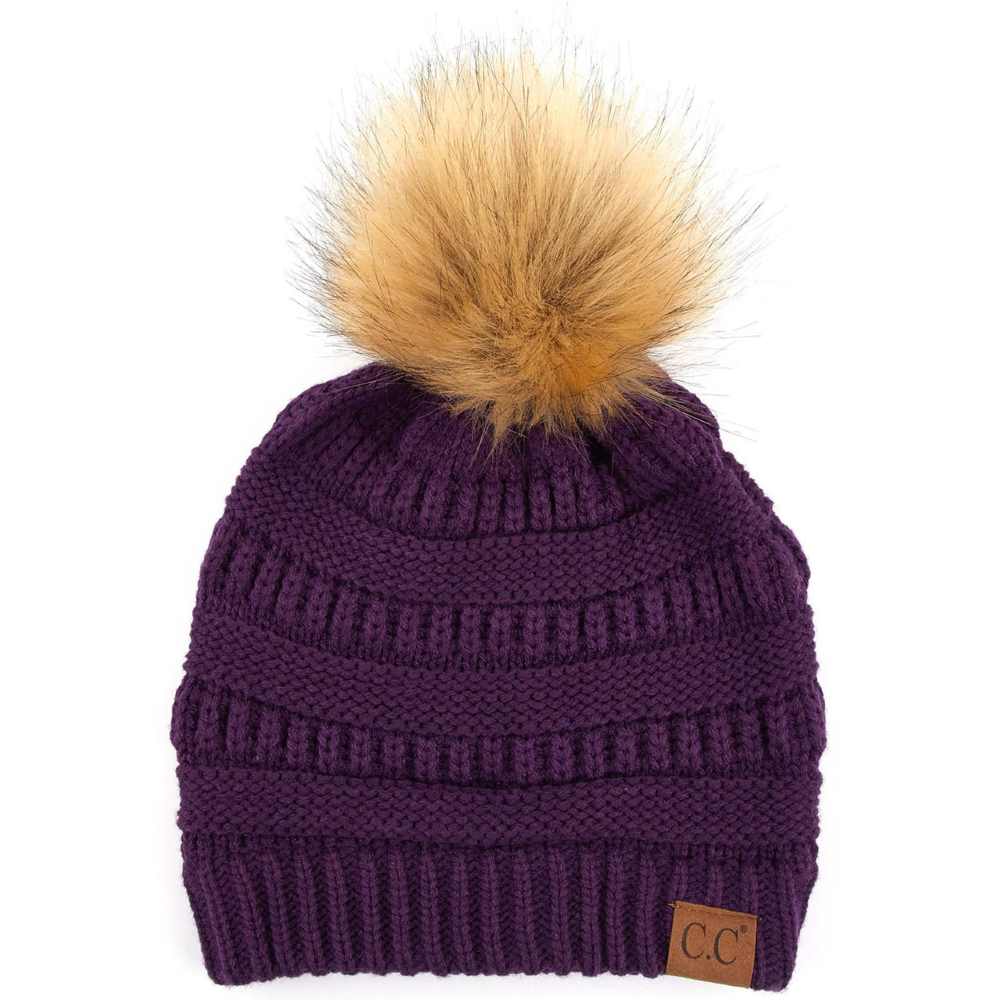 Dark Purple Stay warm and cozy with this classic C.C Pom Pom Knit Beanie, crafted from 100% soft acrylic for all-day comfort. The ribbed knit design adds texture and durability, while the signature pom pom on top brings a playful touch to any winter outfit. One size fits most, making it the perfect accessory for everyone. Ideal for cold weather adventures or casual everyday wear.