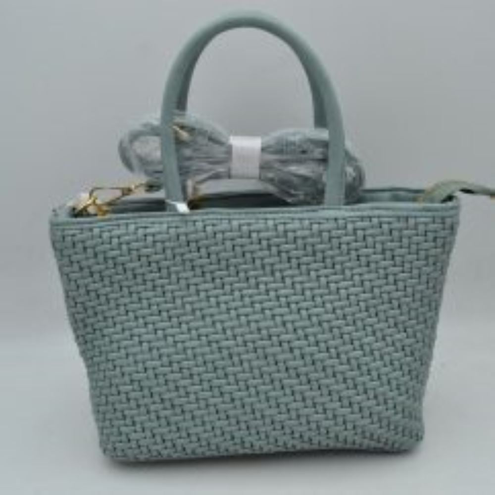 Dark blue This charming mini tote bag features an intricate woven exterior design in a refreshing dusty sage green hue, offering a textured and chic look for daily outings. It is detailed with structured, rounded dual top handles for a classic hand carry and a secure top zipper closure to keep your essentials safe. Complete with gold-tone hardware, the bag includes a matching detachable, adjustable shoulder strap that easily transitions the piece into a hands-free crossbody.